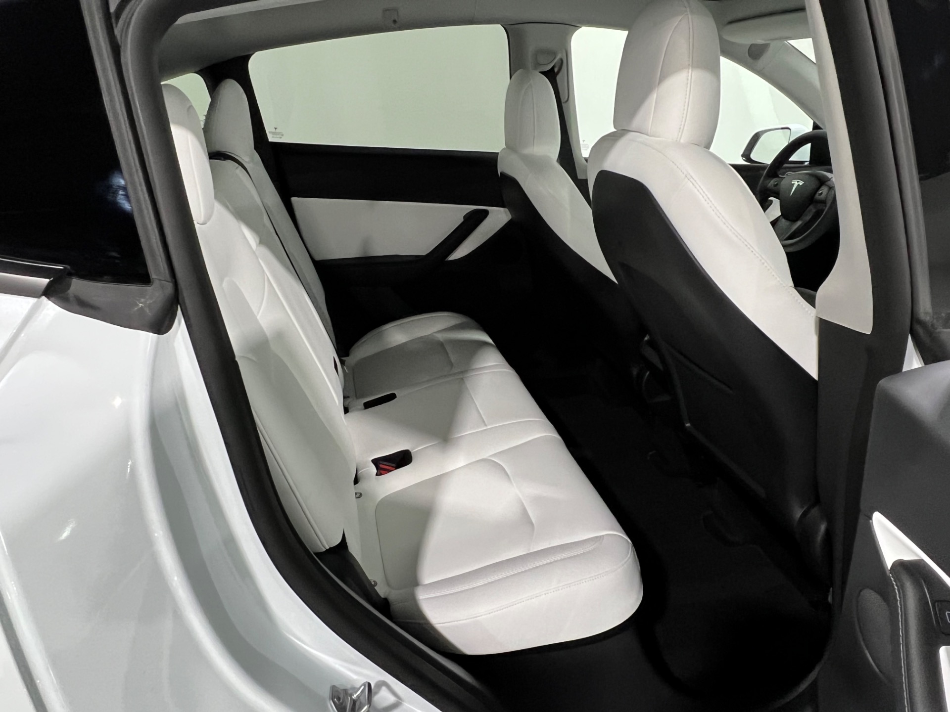 2022 Tesla Model Y Performance Finished in Pearl White Multi-Coat Exterior  Wrapped in Miami Blue over Black Interior w/ 8,600…