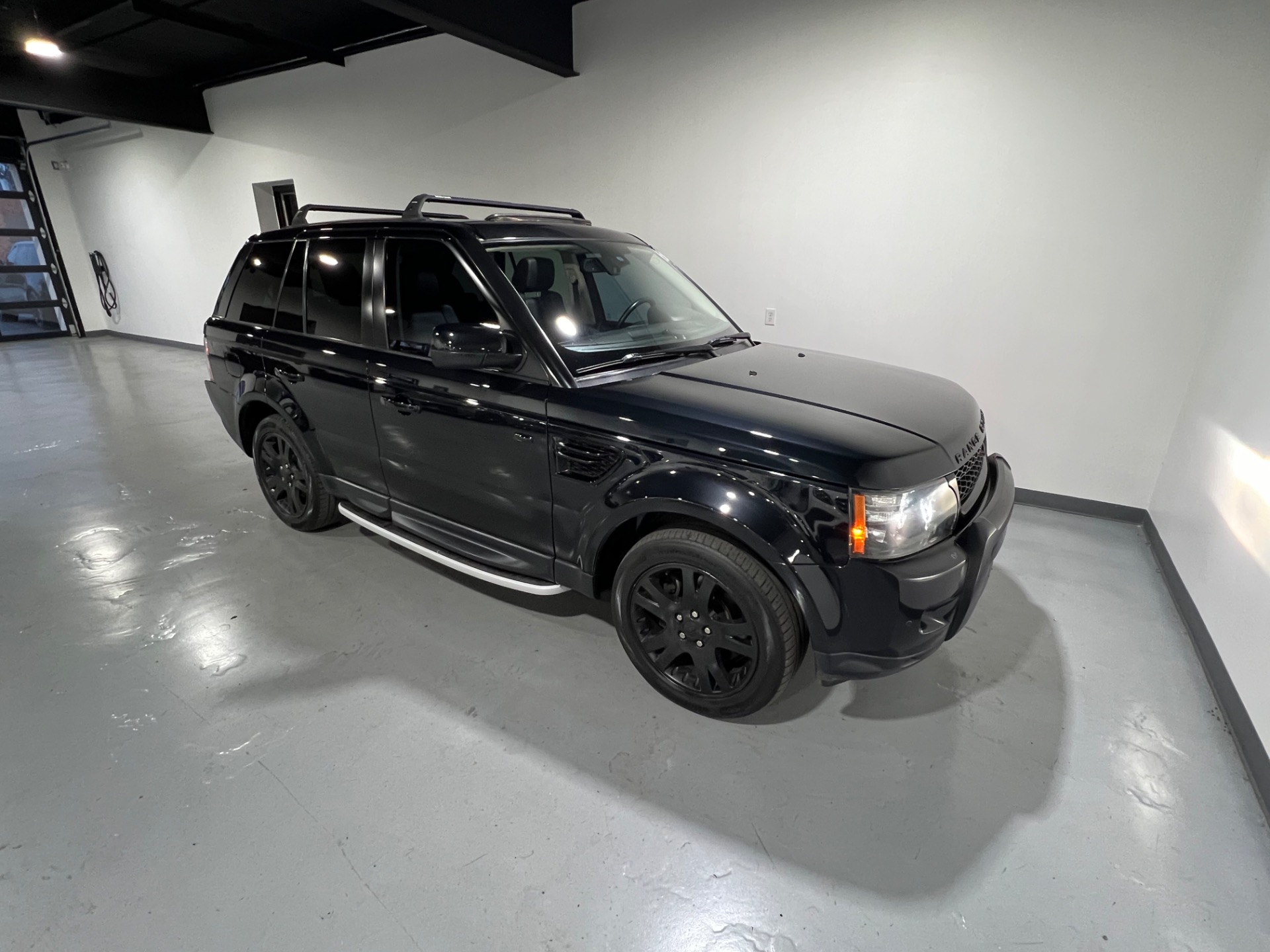 Used 2012 Sumatra Black Metallic Land Rover Range Rover Sport HSE
