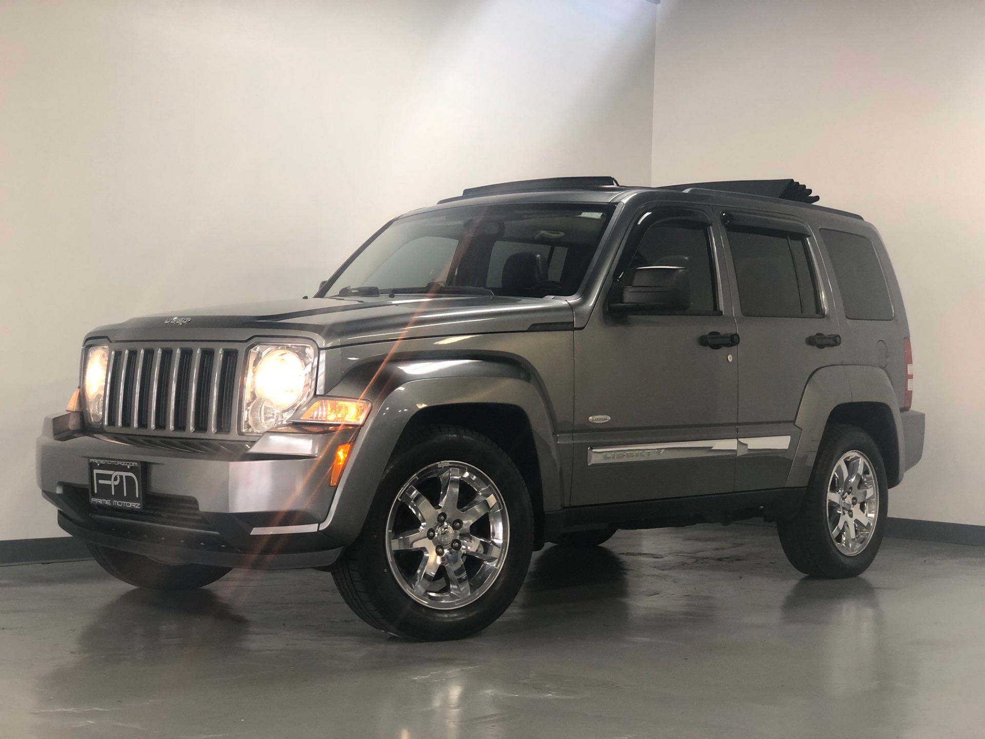 images 2012 Jeep Liberty Arctic Edition used 2012 mineral gray metallic clear